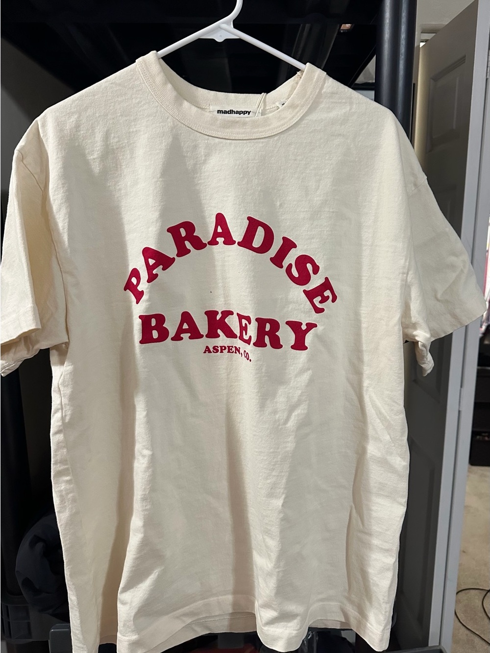 madhappy Paradise Bakery Aspen Collab Tee in Cream with Red Print BNWT